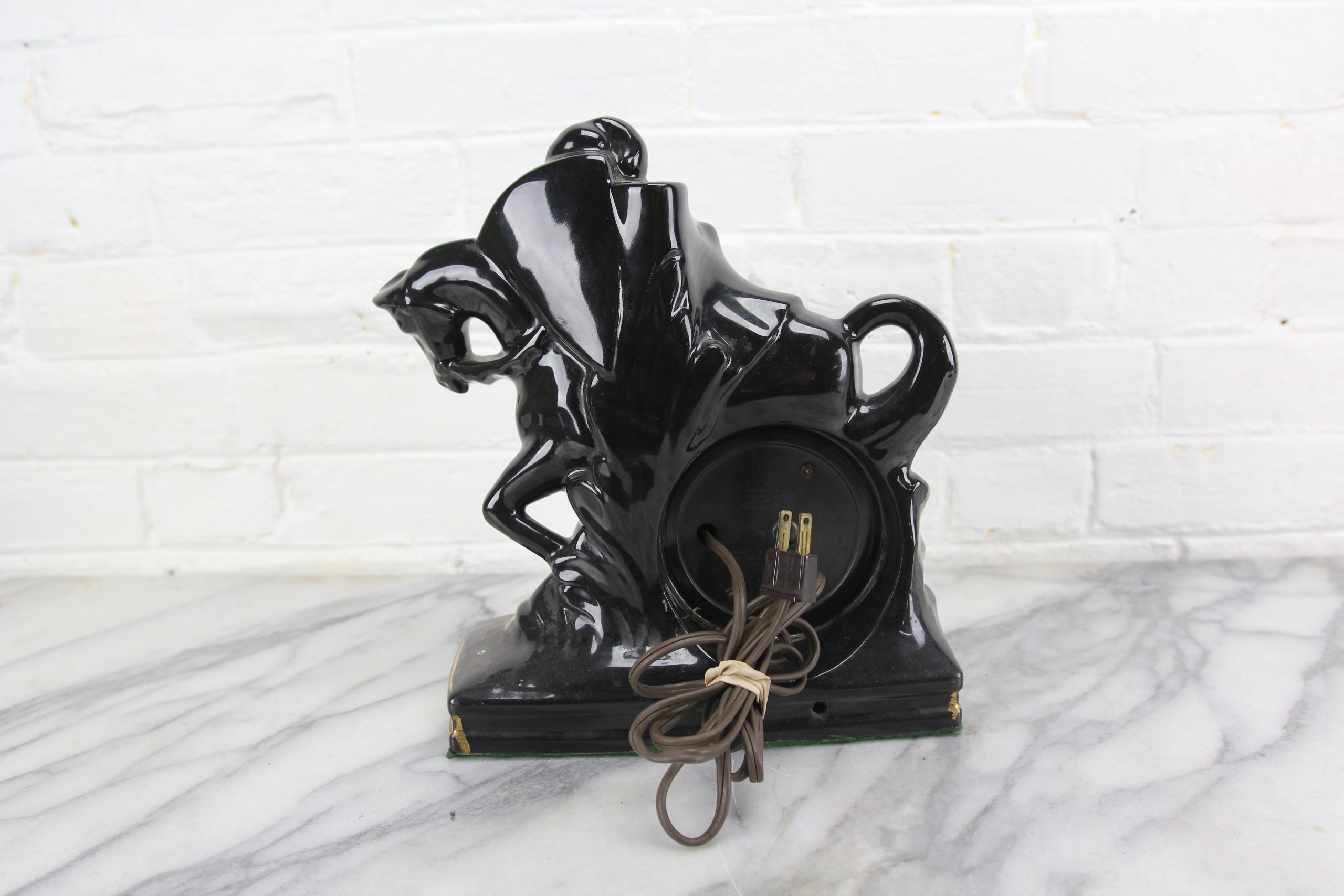 shop-your-favorite-black-porcelain-charging-knight-on-horse-clock-sessions-supply_4.jpg