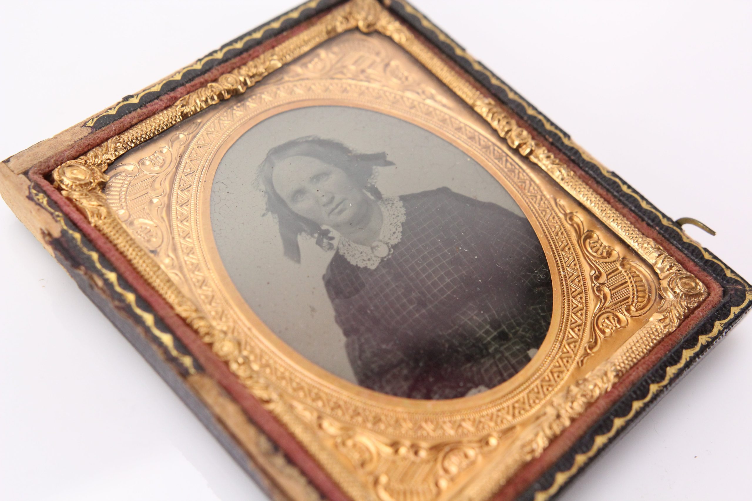 get-ambrotype-photograph-of-a-woman-with-brooch-in-half-case-1-6th-plate-discount_1.jpg