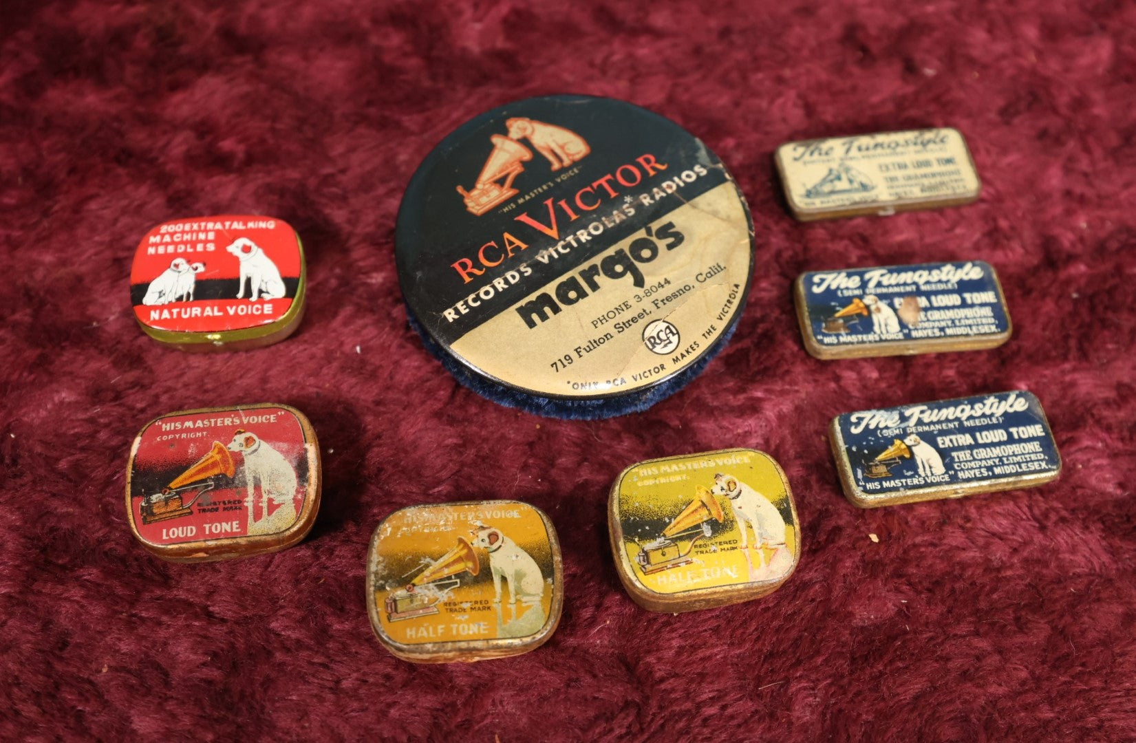 best-lot-099-eight-piece-rca-victor-victrola-lot-featuring-nipper-the-dog-mascot-advertising-for-margos-record-store-fresno-california-plus-many-small-needle-tins-with-needles-contents-sale_0.jpg